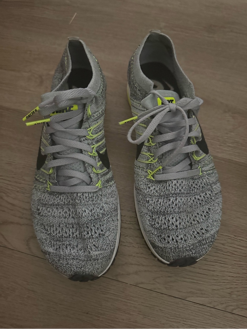 Nike Men's Flyknit Running Sneakers in Light Gray with Neon Yellow Accents